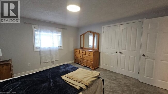 Photo du bâtiment - 10 Doll Ct