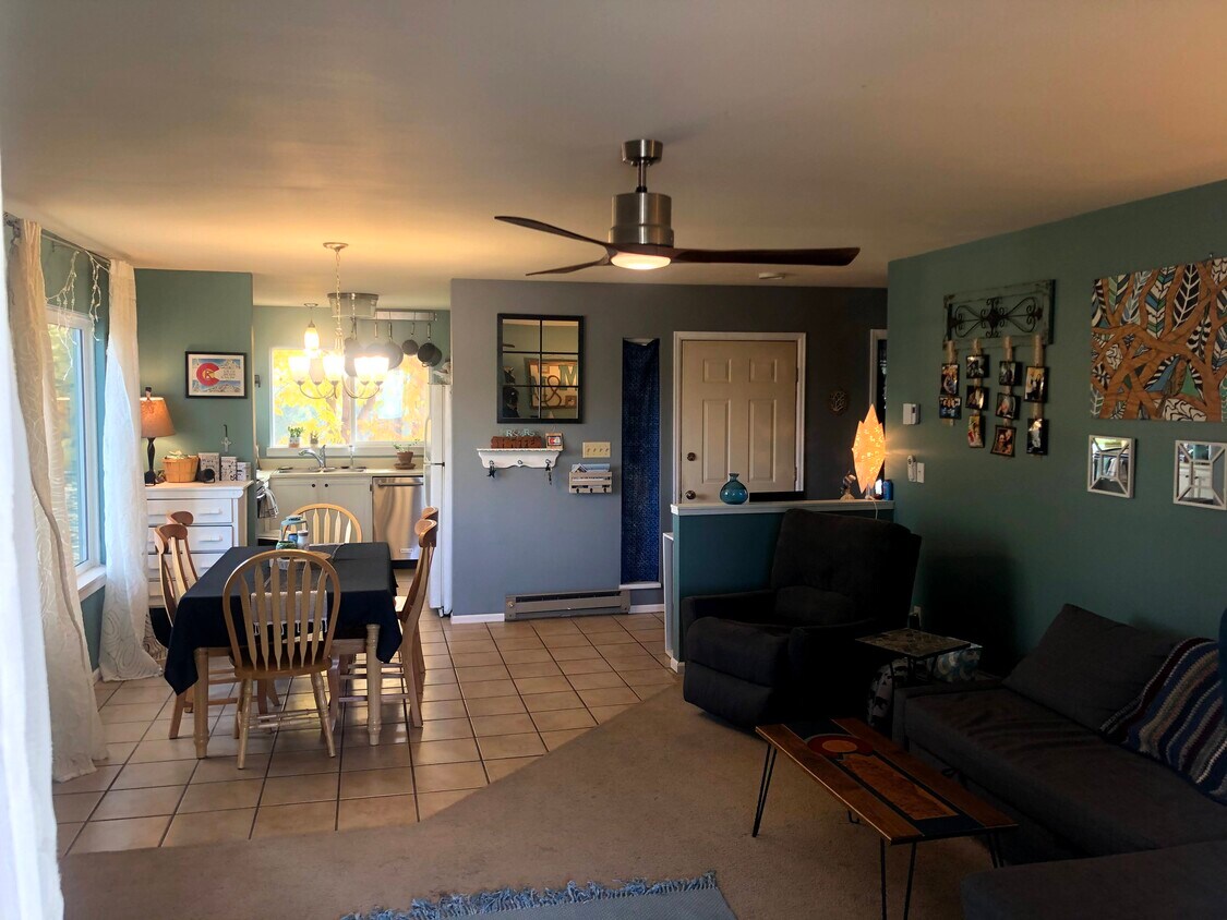 View from sliding door, looking into living room, dining room and kitchen - 3465 Lochwood Dr