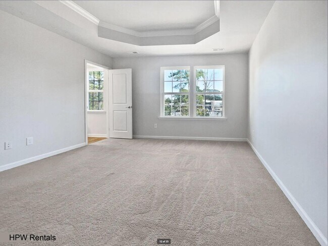 Building Photo - 3-Story End Unit Townhome with 3 Beds, 3 B...