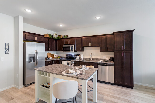 Kitchen with Island - Anchor View Apartments