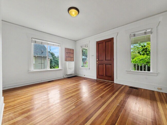 Building Photo - AVAILABLE NOW! Crown Hill Gem with 3 bedrooms, Private Balcony, Deck & EV Charging