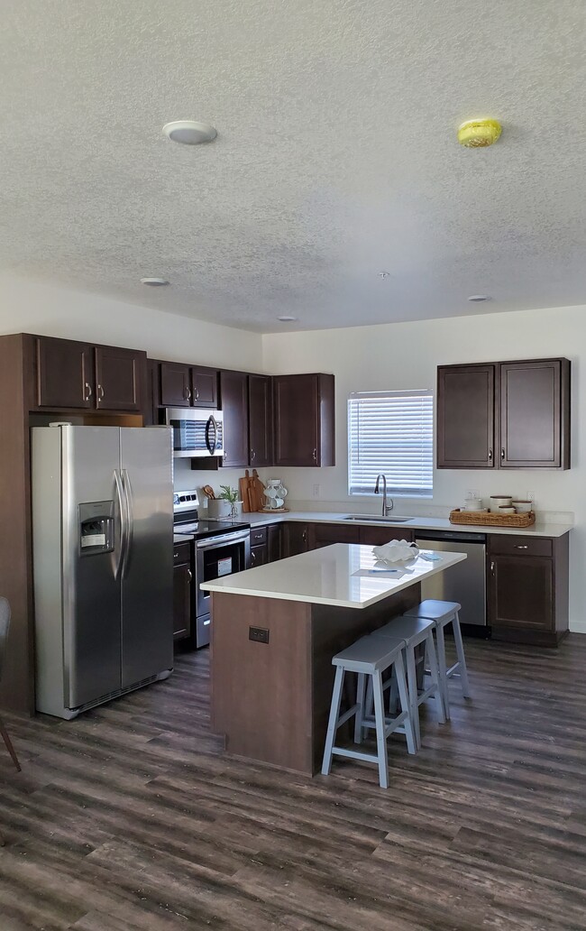 Kitchen with Island - Providence Lane Townhomes