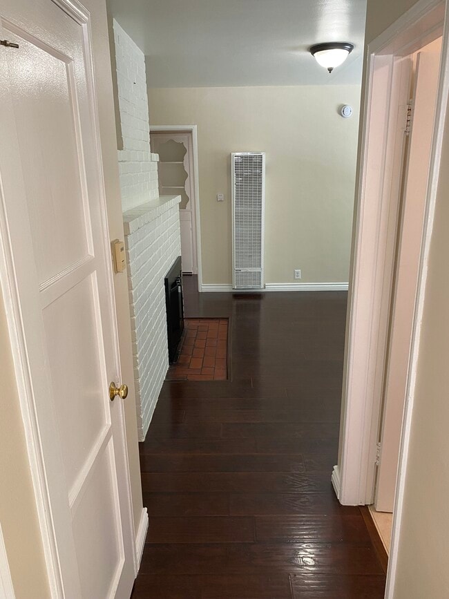 Hallway to living room and bathroom - 11280 Morrison St