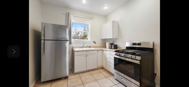 Kitchen with Full-size Fridge and Gas Range - 2834 Dumaine St