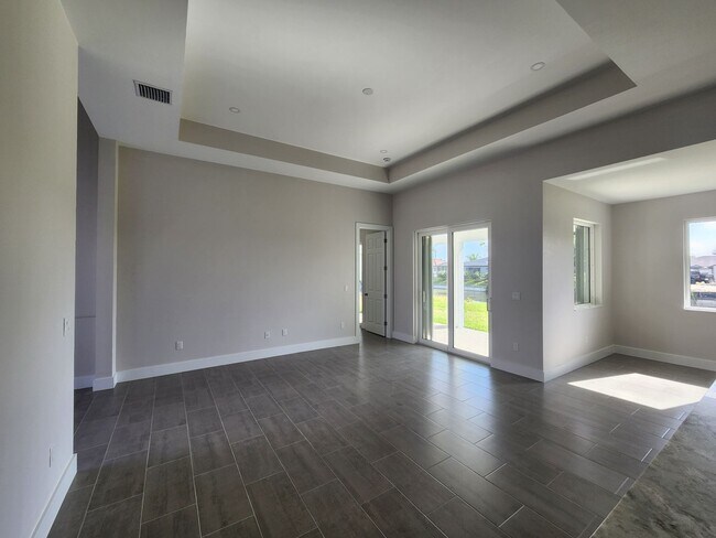 Building Photo - Beautiful New Construction 4BR/ 2BA In Cap...