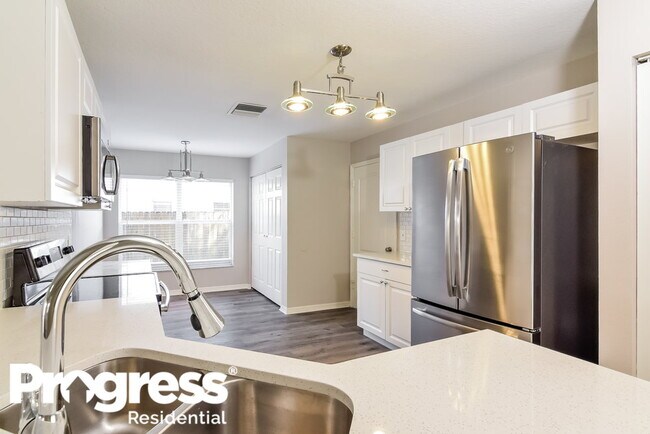 Foto del edificio - 9726 Cypress Pond Ave