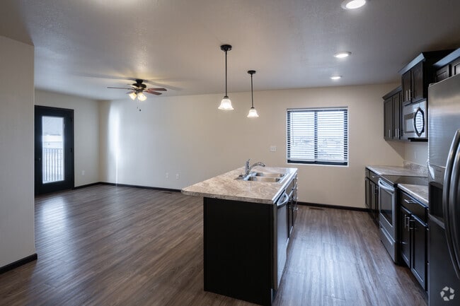 1BR, 1BA - 716SF - Kitchen and Living Room - Fox Run Apartments