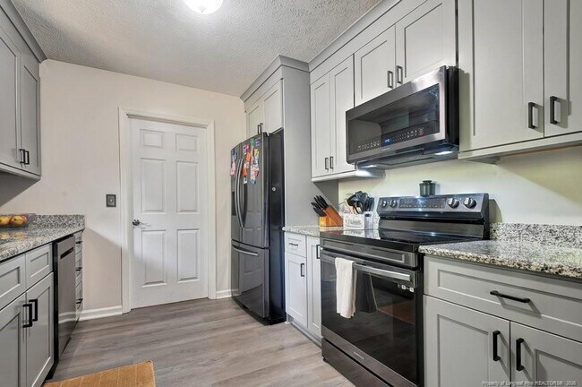 Building Photo - 5487 Bush Ct