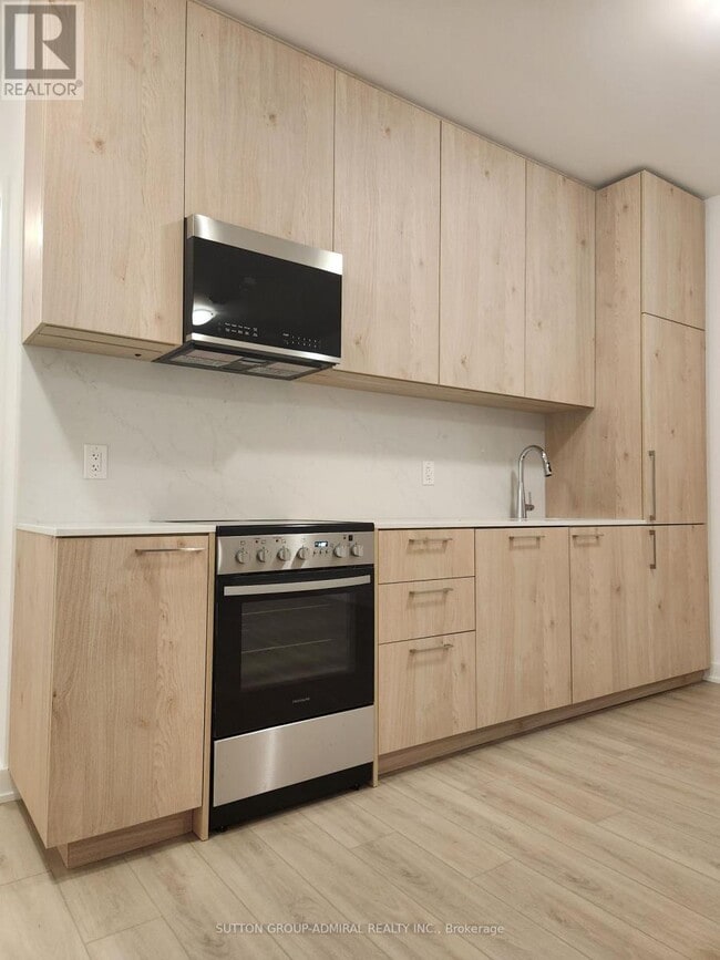 Building Photo - 7439 Kingston Rd