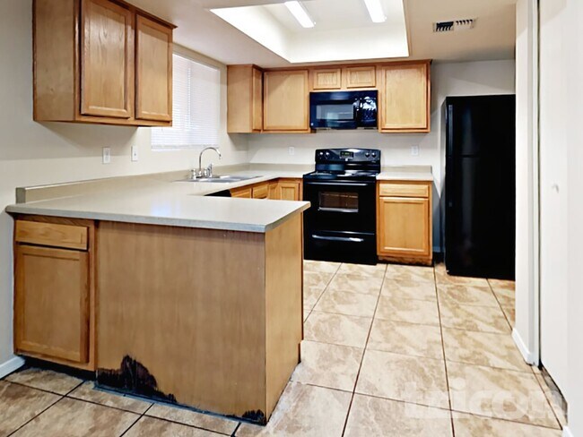 Foto del edificio - 6908 W Denton Ln