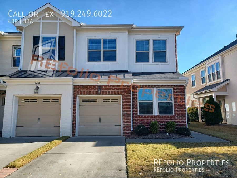 Primary Photo - Great Location! 4BR 1-Car Garage End Unit ...