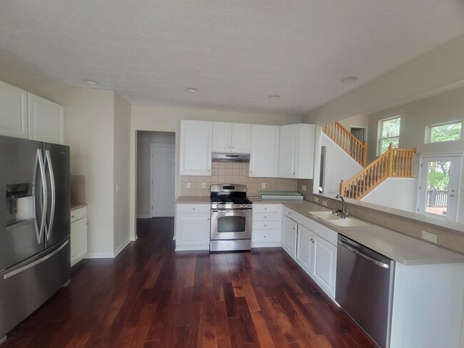 Foto del edificio - 6444 Hilltop Trail Dr