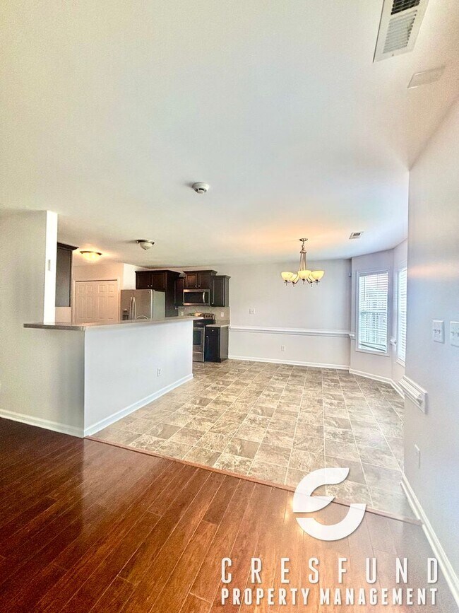 Building Photo - Freshly Painted and Spacious 4 Bedroom, 3 ...
