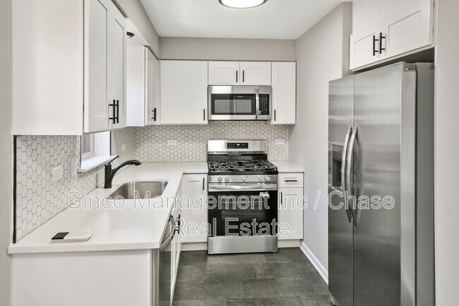 Building Photo - 7704 McVicker Ave
