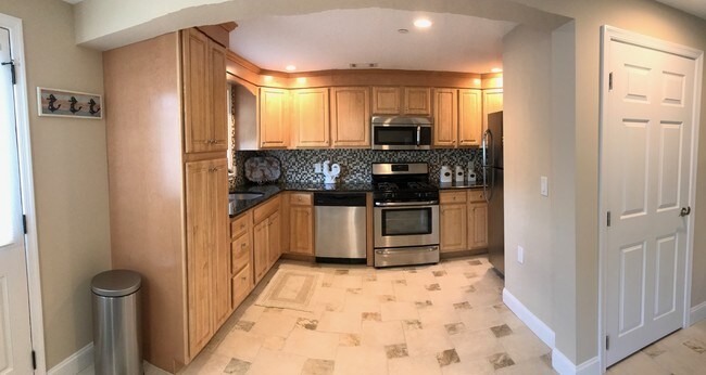 stainless steel appliances & granite counter - 101 S Frankfort Ave