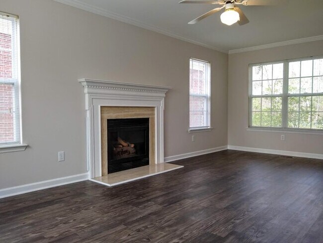 Living room with gas fireplace. - 5133 Bay Overlook Dr