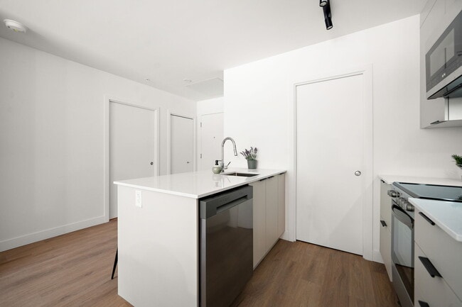 Building Photo - SUMA Rental Condos