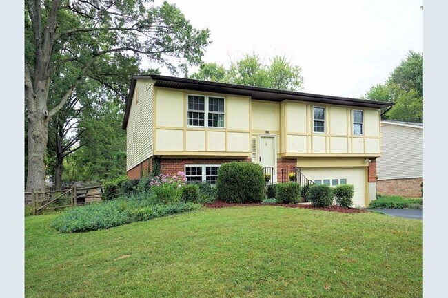 Front view of home on quiet residential street - 5170 Bell Ave