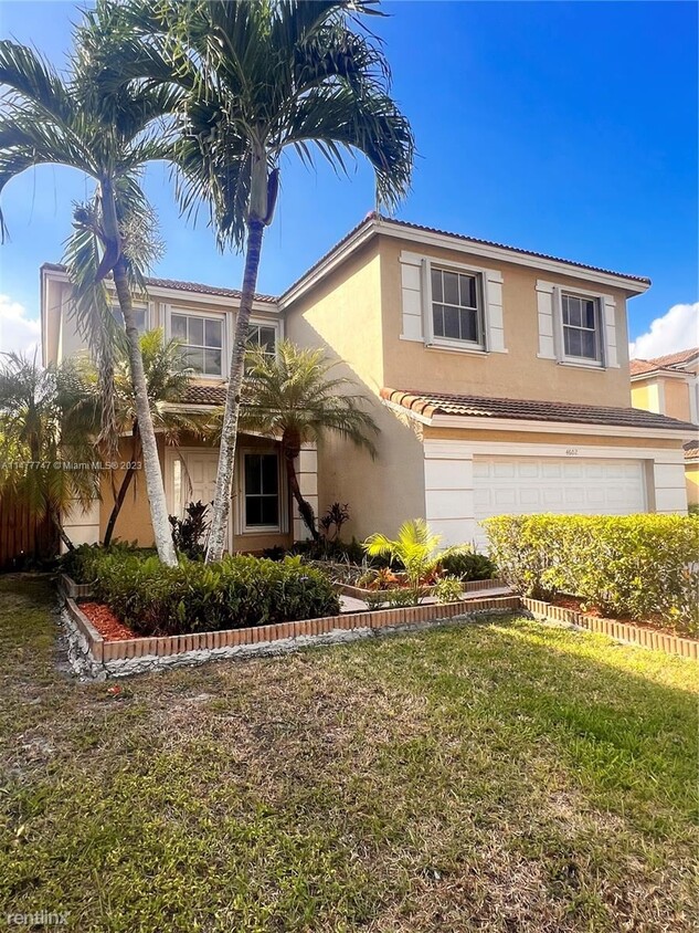 Foto principal - 4 br, 3 bath House - 4602 NW 94th Ct