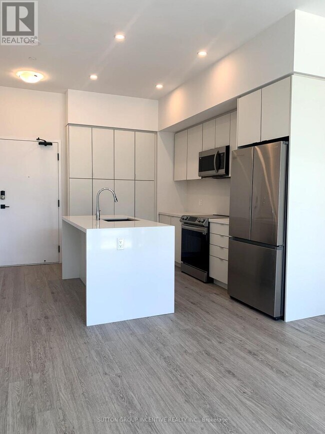 Photo du bâtiment - 415-415 Sea Ray Ave