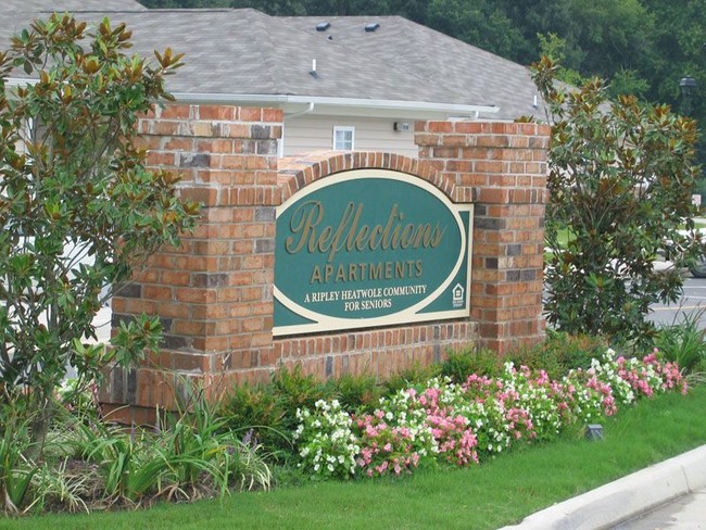 Sign - Reflections Apartments