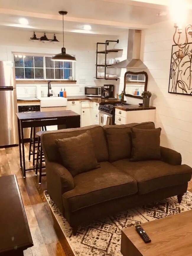 Fully stocked kitchen and comfy couch in living room - 510 Auburndale Ave