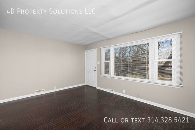 Building Photo - Charming 3-Bedroom Home in St. Louis with ...