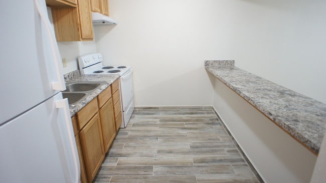 Building Photo - Pet Friendly Studio Apartment Available Now!