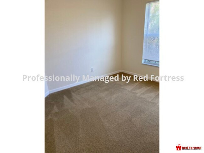 Building Photo - Spacious home with a water view in a gated...