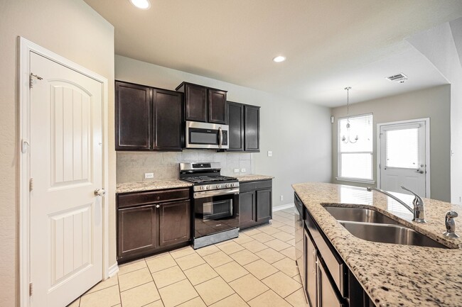 Building Photo - 5 BR/3.5BA | Newly Renovated Single Family Home | 1-Car Garage Parking | Fenced Backyard!