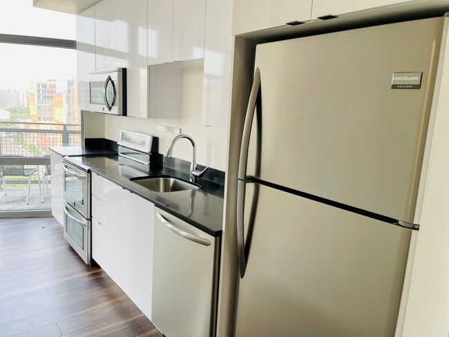 High gloss cabinets and stainless steel applicances - 460 New York Ave NW