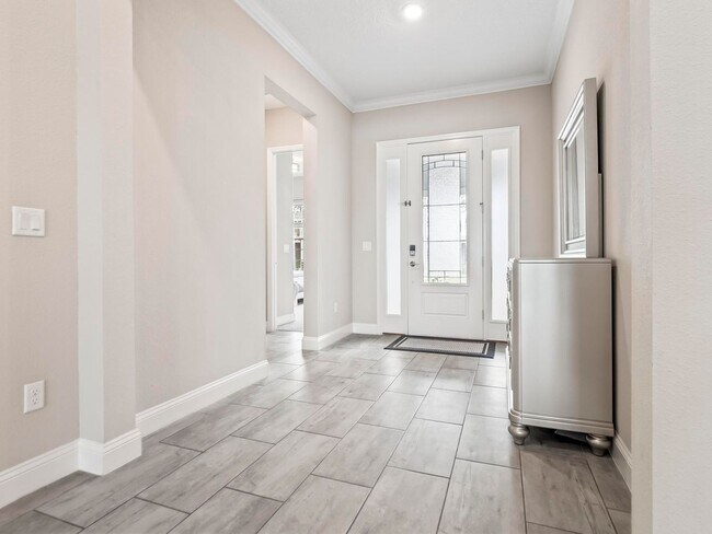 Foto del edificio - Stunning 4-Bedroom Home with Gourmet Kitch...