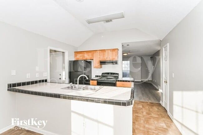 Building Photo - 7678 Breeze Wood Cove