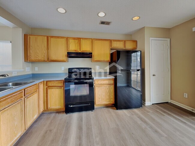 Building Photo - 6021 Ladish Ln
