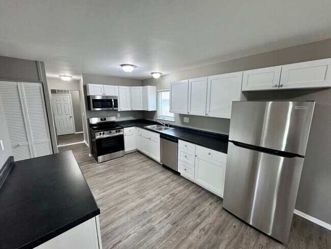 Building Photo - 5655 Alpine - 4 bed/2.5 Bath Fully Renovated