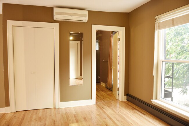 Bedroom looking into bathroom - 310 S Franklin St