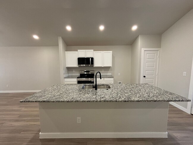 Building Photo - Brand-New 3-Bedroom Gem in Bells Farms – Y...