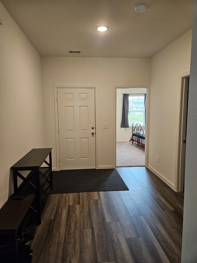 Location of room next to front door. - 5919 Bright Keel Dr