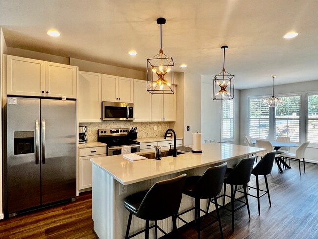 Kitchen and dining area - 2215 Swallowtail Ln