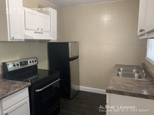 Building Photo - Near Westside 2BR House w/Carport!
