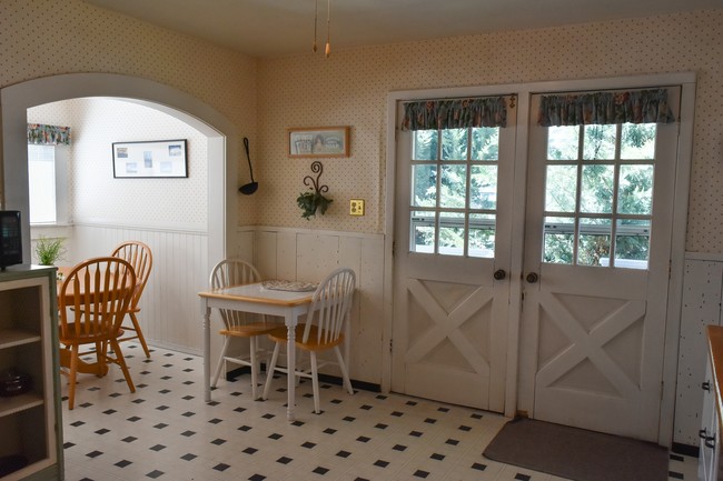 Flat 1 kitchen opens to the breakfast porch - 309-311 Quincy St