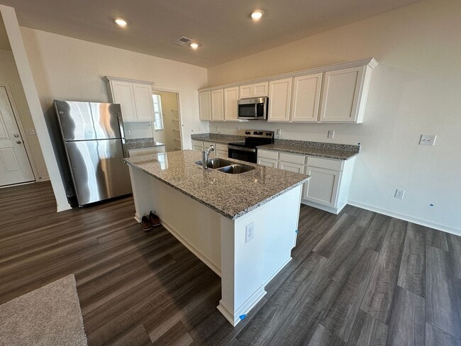 Building Photo - BRAND NEW CONSTRUCTION RENTAL IN THE MEADO...