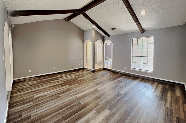 Building Photo - Darling Fort Worth Duplex! Vaulted Ceilings, Wood Beams & Covered Outdoor Living!