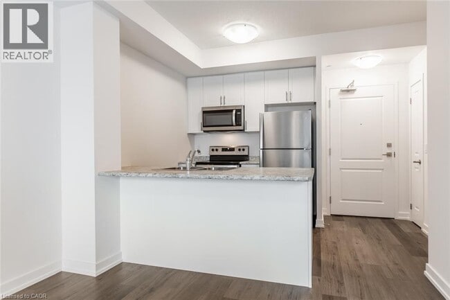 Photo du bâtiment - 5055 Greenlane Rd