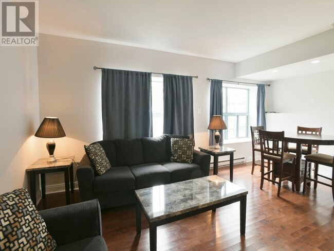 living room with dining area - 130 Lemarchant Rd