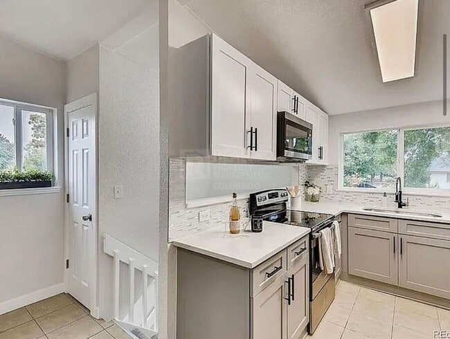 Photo - 7110 E 63rd Ave House