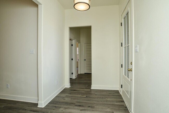 Building Photo - Available Now! Show Stopping New Construct...