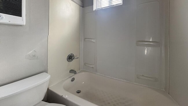 Photo - Move-In Ready 3-Bedroom Home with Stylish Hardwood-Style Flooring