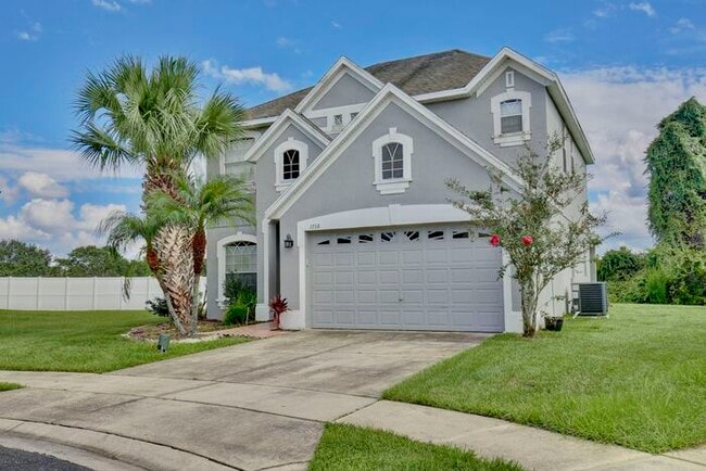 Building Photo - Gorgeous 4/2.5 Home with a 2 Car Garage Lo...