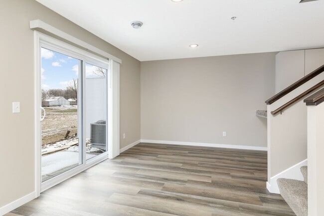 Building Photo - Like New, for RENT 3bd 3ba 2 car attached garage END UNIT available June 01